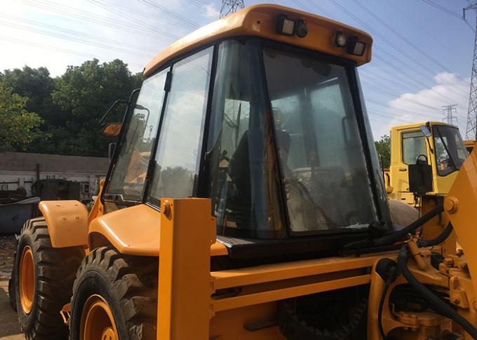 Horários laborais de 1800h 2014 carregador da roda de mão do JCB 4CX segundos do ano 3